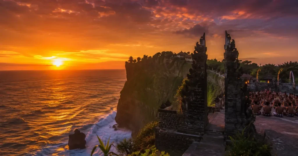 Uluwatu Temple at sunset in Bali — budget travel experience with Kecak fire dance and ocean views